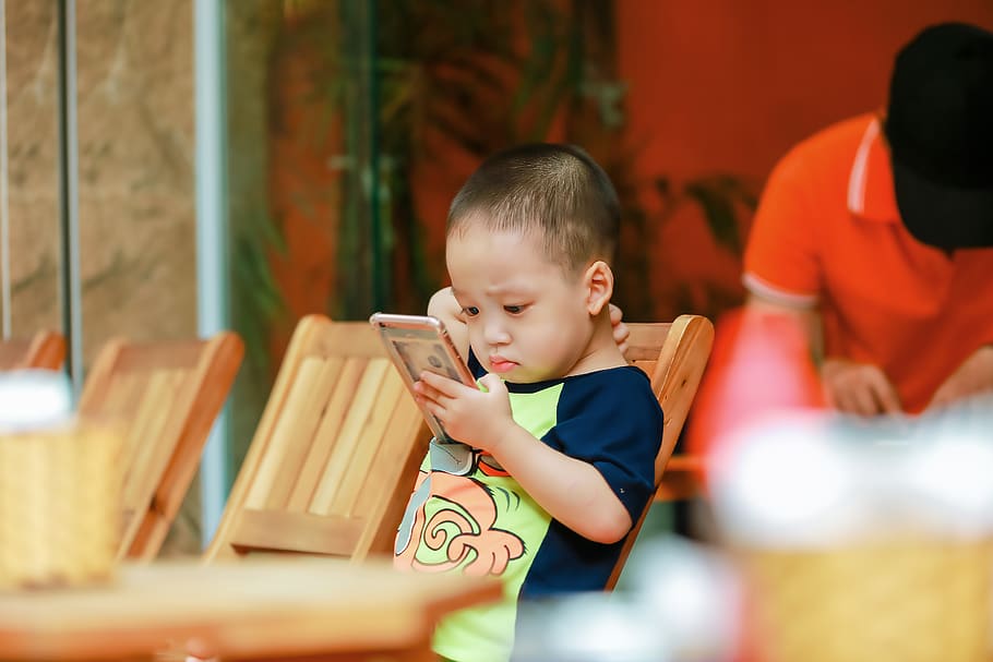 Selective Focus Photography of Toddler Holding Smartphone, boy HD wallpaper