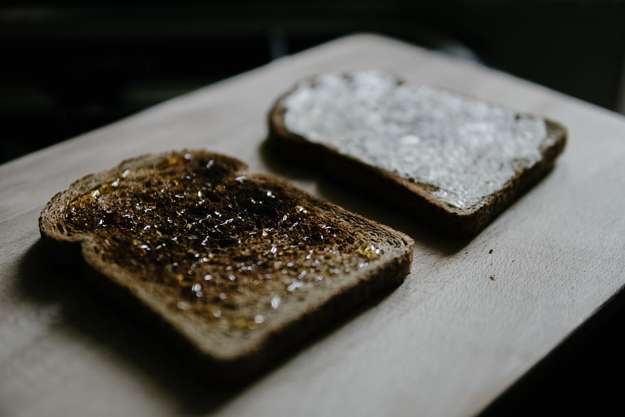 two toasted breads on wooden table, food, food and drink, selective focus HD wallpaper