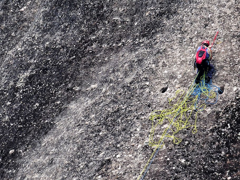 man climbing on mountain, asphalt, tarmac, meteora, greece, kalampaka, HD wallpaper