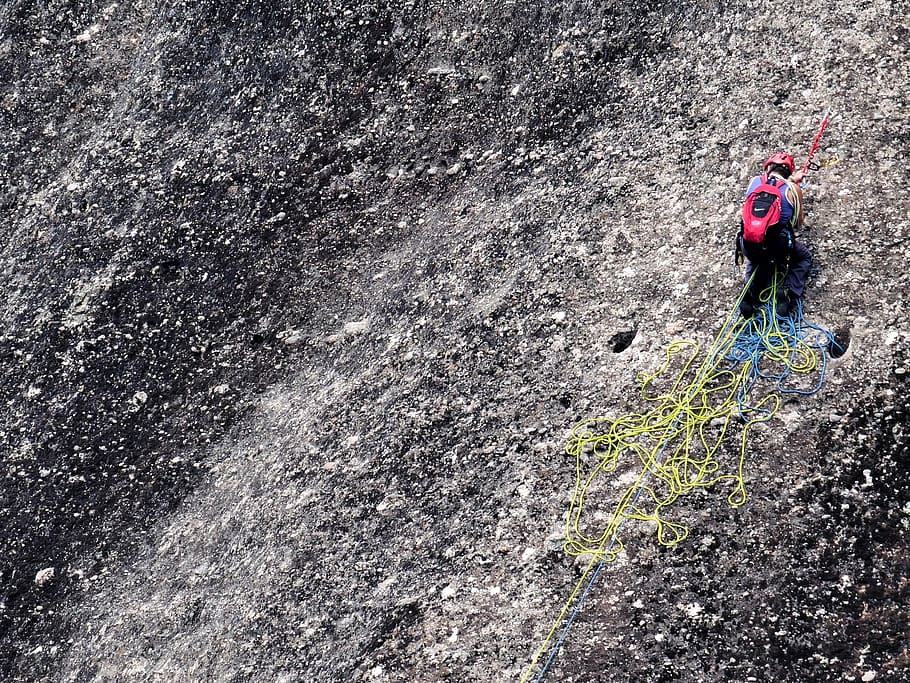 man climbing on mountain, asphalt, tarmac, meteora, greece, kalampaka HD wallpaper