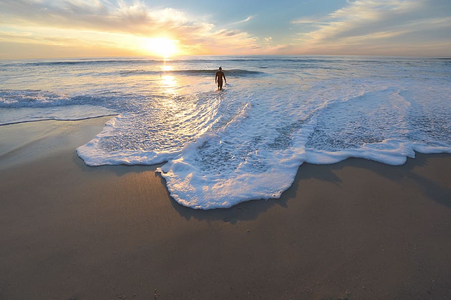 man standing on seashore during sunset, sky, water, land, beach HD wallpaper