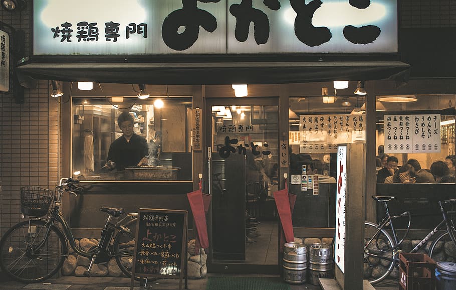 man's eye view of Japanese restaurant, illuminated, food and drink