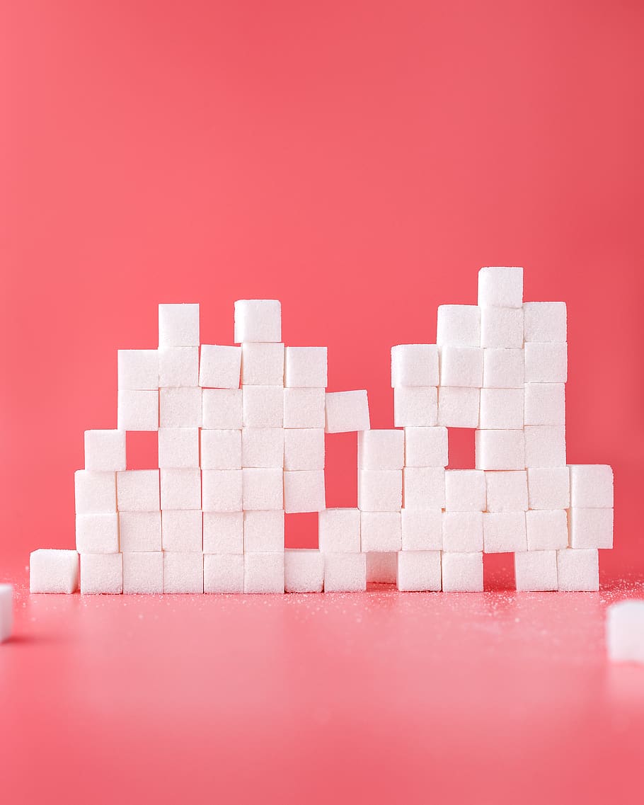 white sugar cube forming lines, colored background, studio shot HD wallpaper