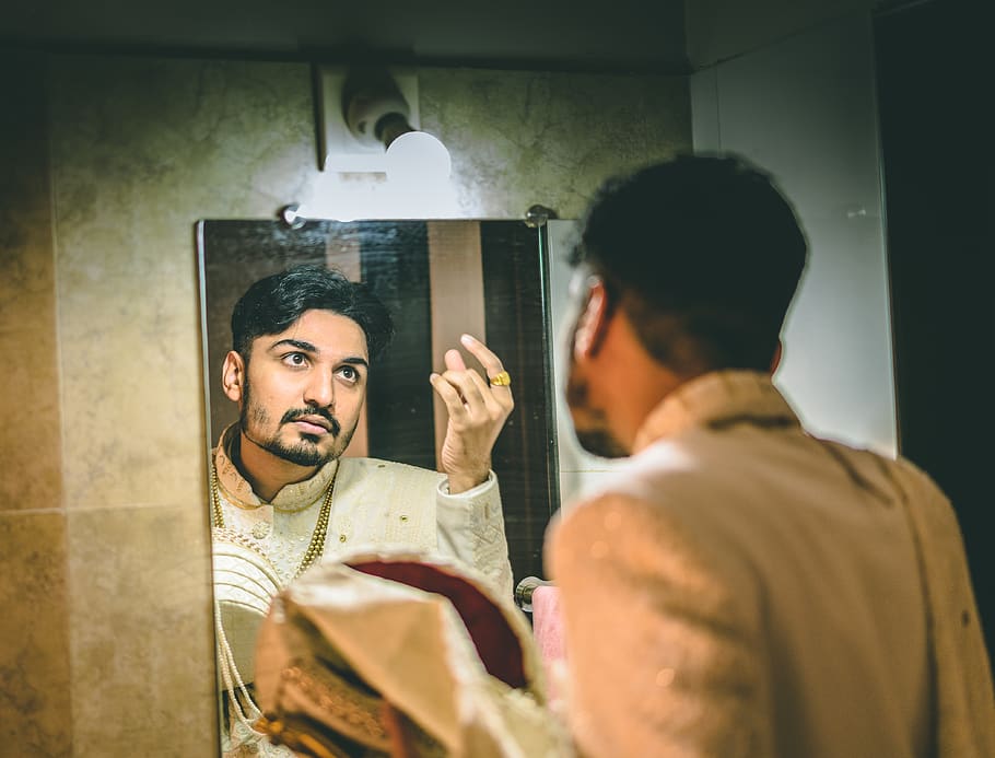 man facing at the mirror, person, human, apparel, clothing, sitting HD wallpaper