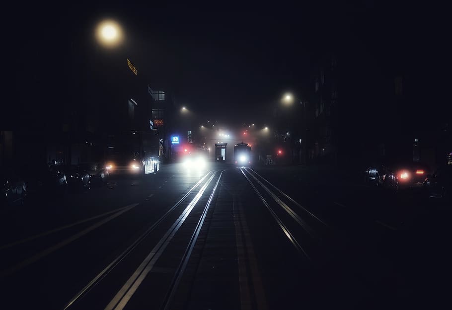 vehicles passing on road, dark, fog, track, train, light, night HD wallpaper