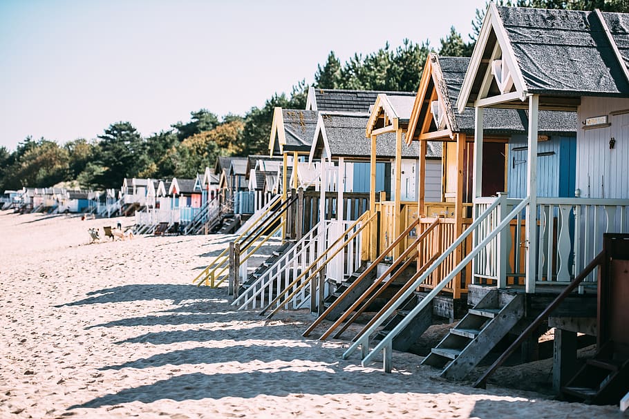 Photo of Wooden Huts on the Beach, beach huts, blur, daylight HD wallpaper