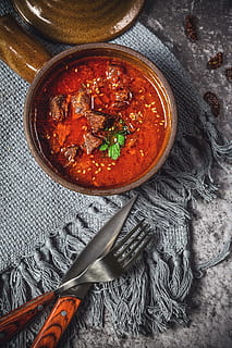skewed meat in bowl beside knife and fork, curry, stew, soup HD wallpaper