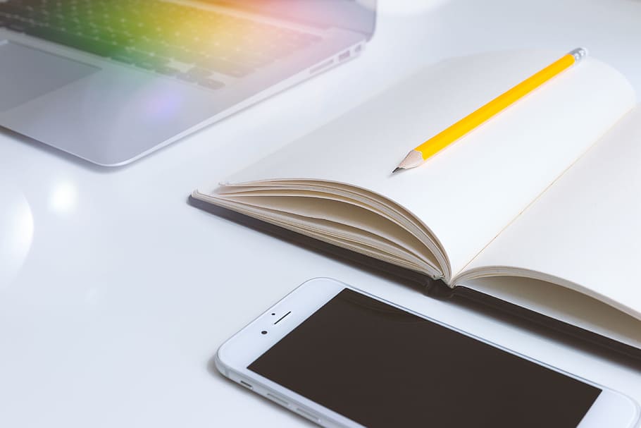 Office white work desk with the notes, smartphone and laptop HD wallpaper
