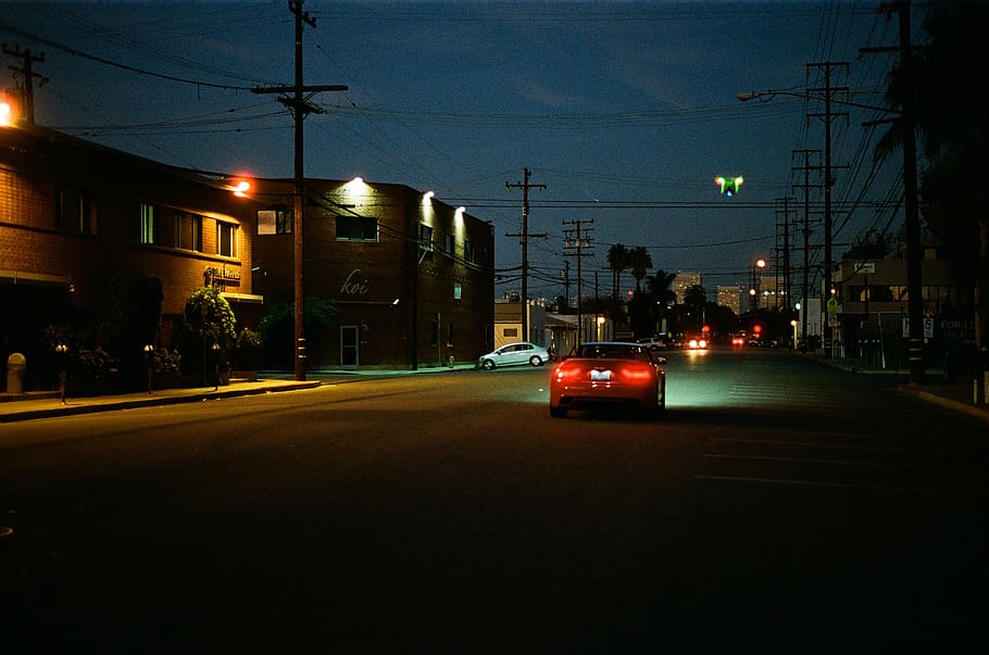 red, car, lights, dark, street, power lines, road, night, evening HD wallpaper