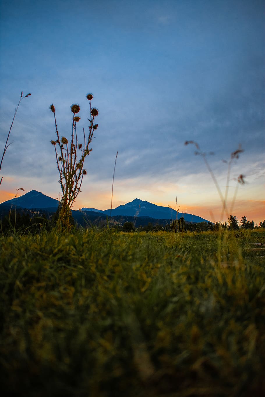 Overlooking View of Mountains Under Dark Clouds, evening, field HD wallpaper