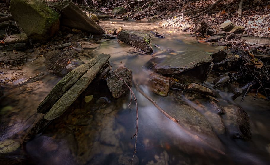 Body of Water Between Black Rock Artwork, creek, environment HD wallpaper