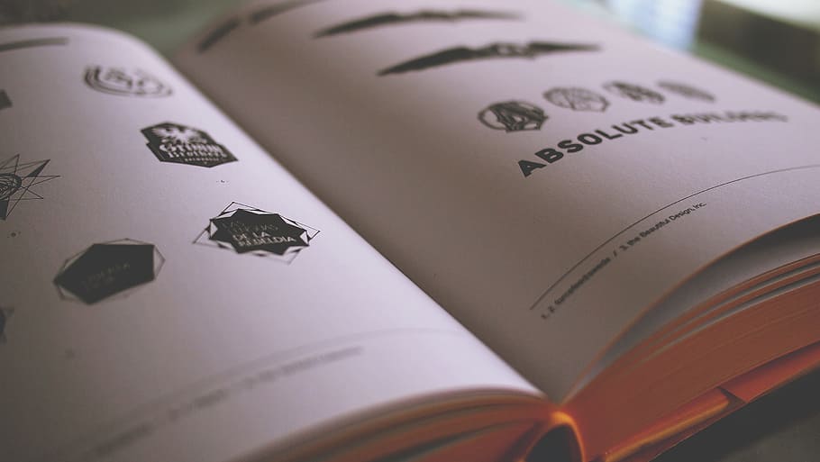 book, reading, pages, logos, graphic design, close-up, no people HD wallpaper