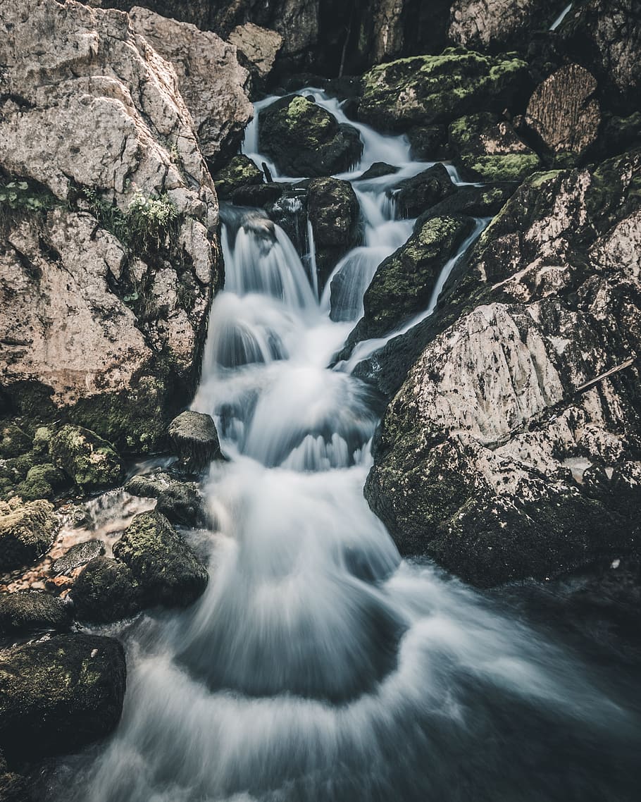 timelaps photography of river with rock formation, waterfall HD wallpaper