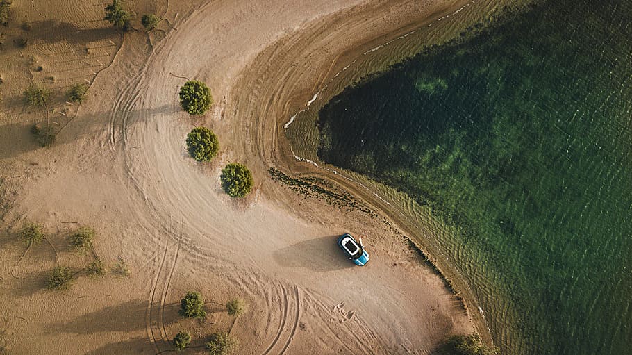 Aerial Photography of Vehicle Parked on Beach Near Bushes, aerial shot, HD wallpaper