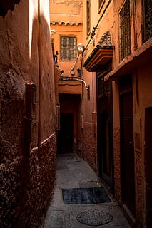 gray asphalt road, town, urban, city, building, corridor, alley HD wallpaper