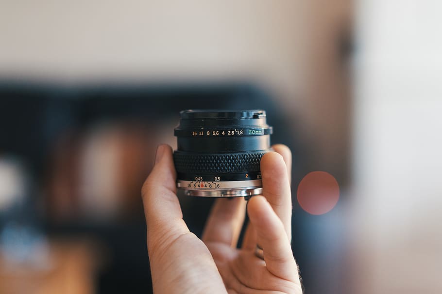selective focus photography of person holding camera lens, prime HD wallpaper