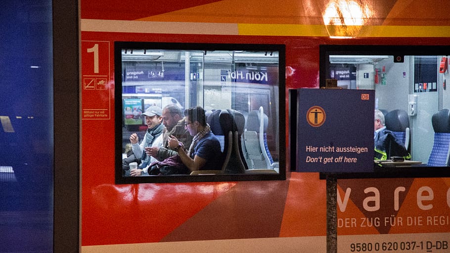 passenger seating inside red and blue train, screen, electronics HD wallpaper