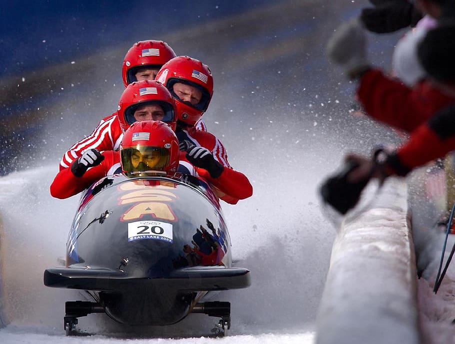 Four Person Riding on Snow Mobile, athletes, bobsled, bobsleigh