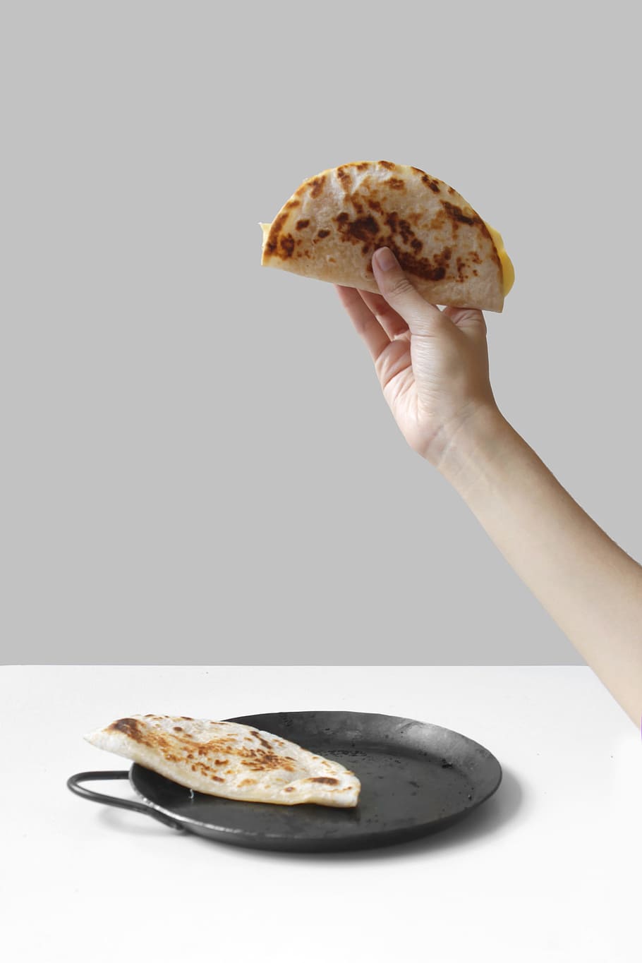 person holding pancake raising it up, hand holding food, grilled cheese, HD wallpaper