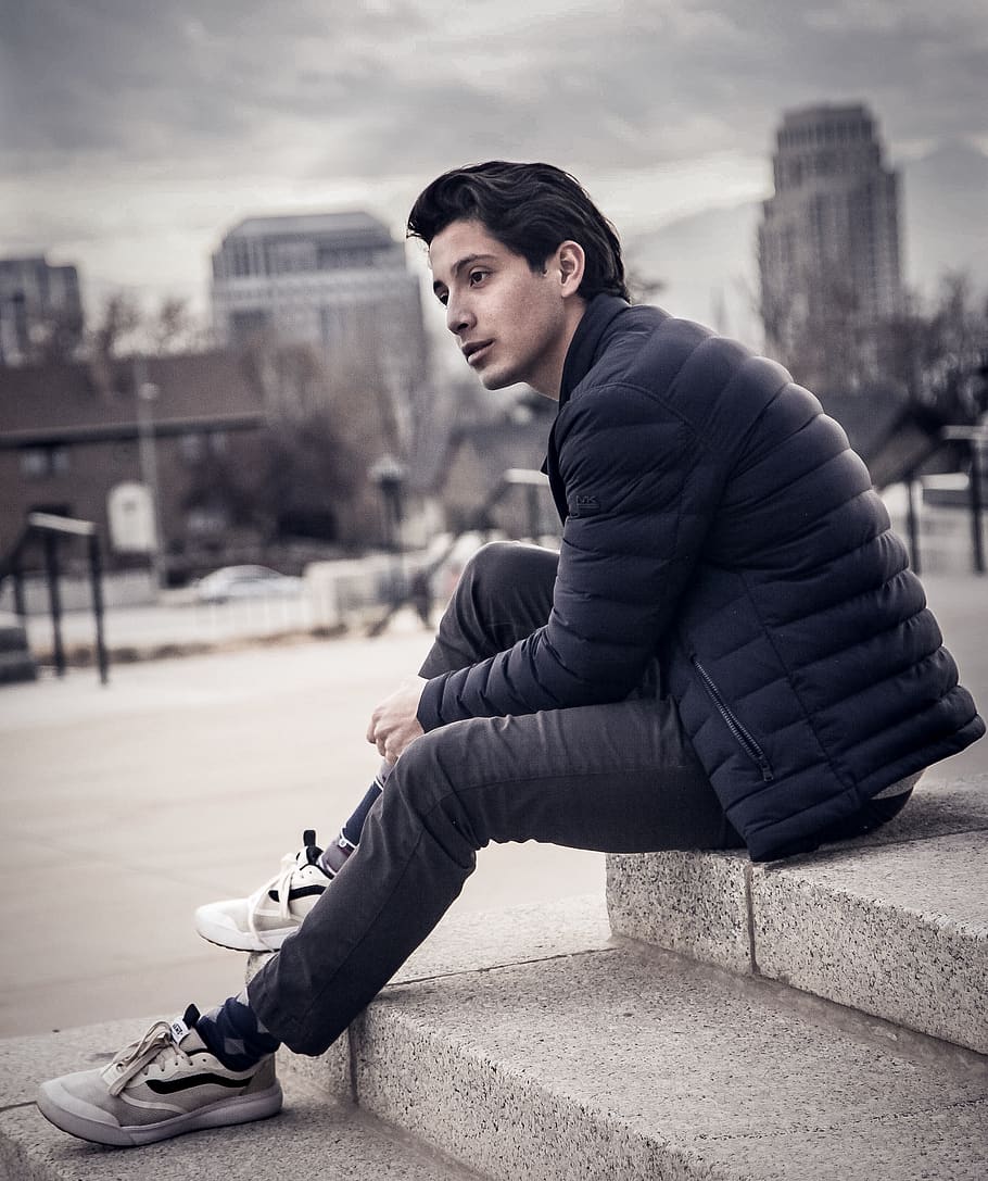 man sitting on concrete surface, one person, architecture, city HD wallpaper