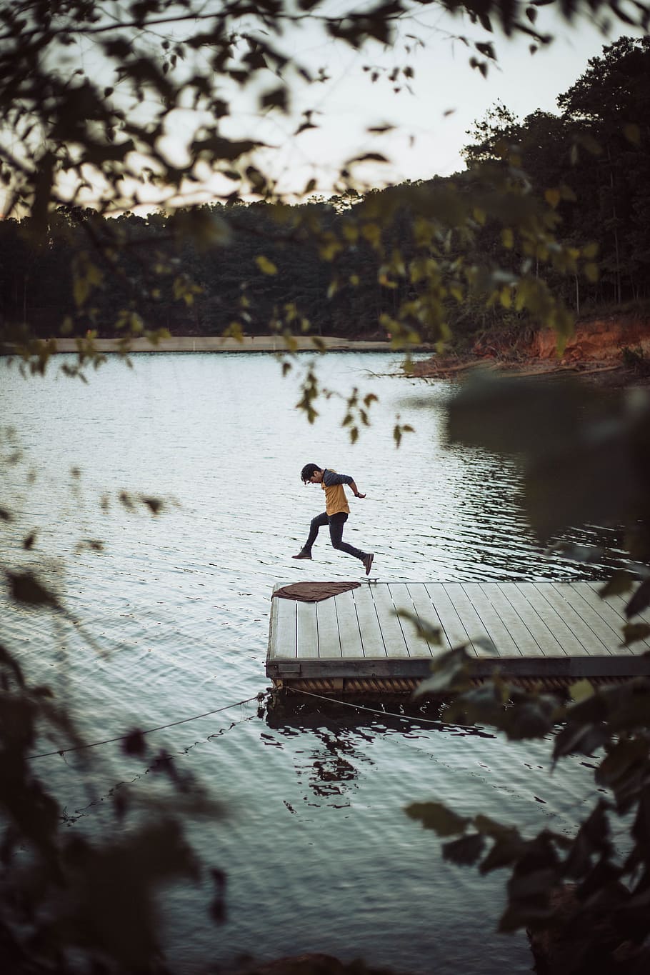 man jumping on wooden dock above body of water, male, dance, dive, HD wallpaper