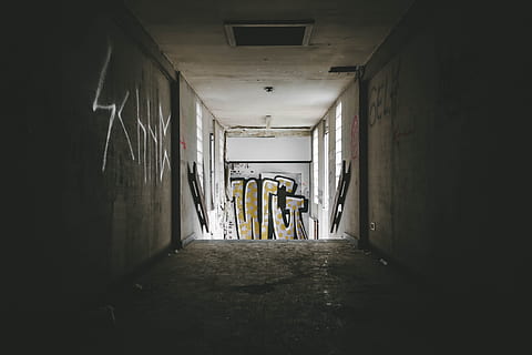 gray skateboard, building, inside, moody, graffiti, light, shadow HD wallpaper