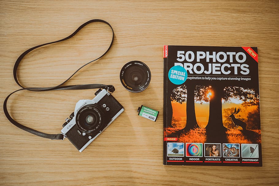 Black Camera And Book On Brown Wooden Surface, analog, technology HD wallpaper