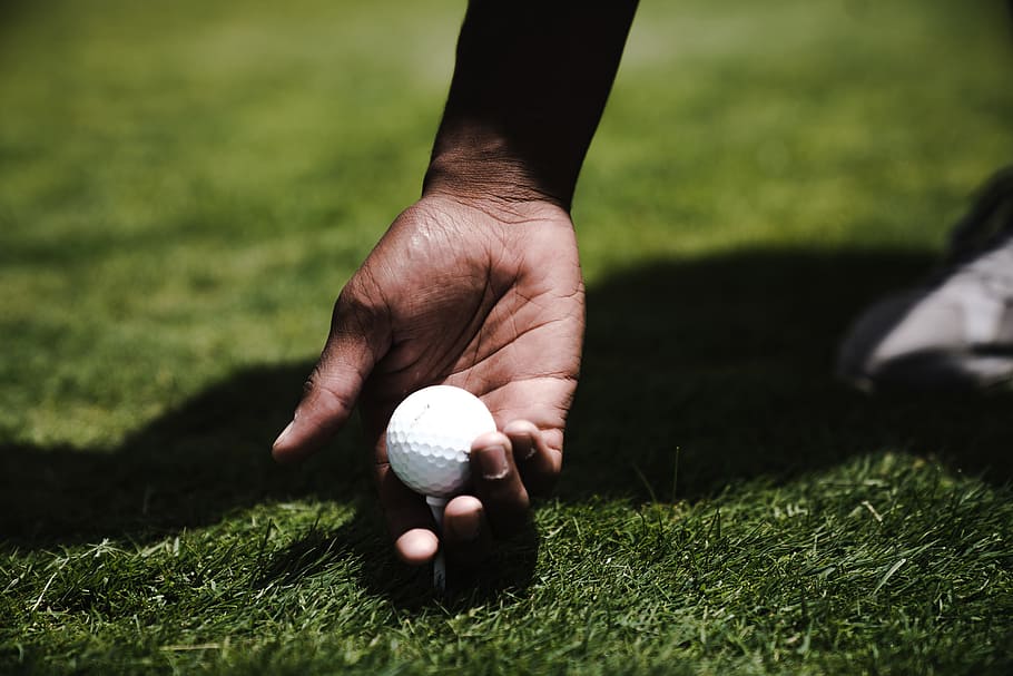Person Holding Golf Ball, close-up, daytime, focus, golf course HD wallpaper