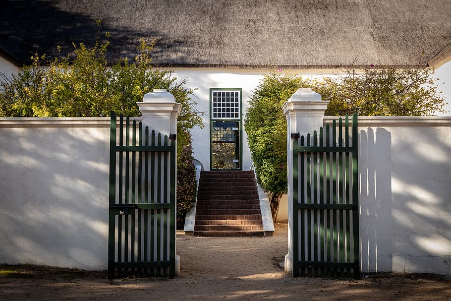 white painted concrete building, gate, fence, turnstile, arbour HD wallpaper