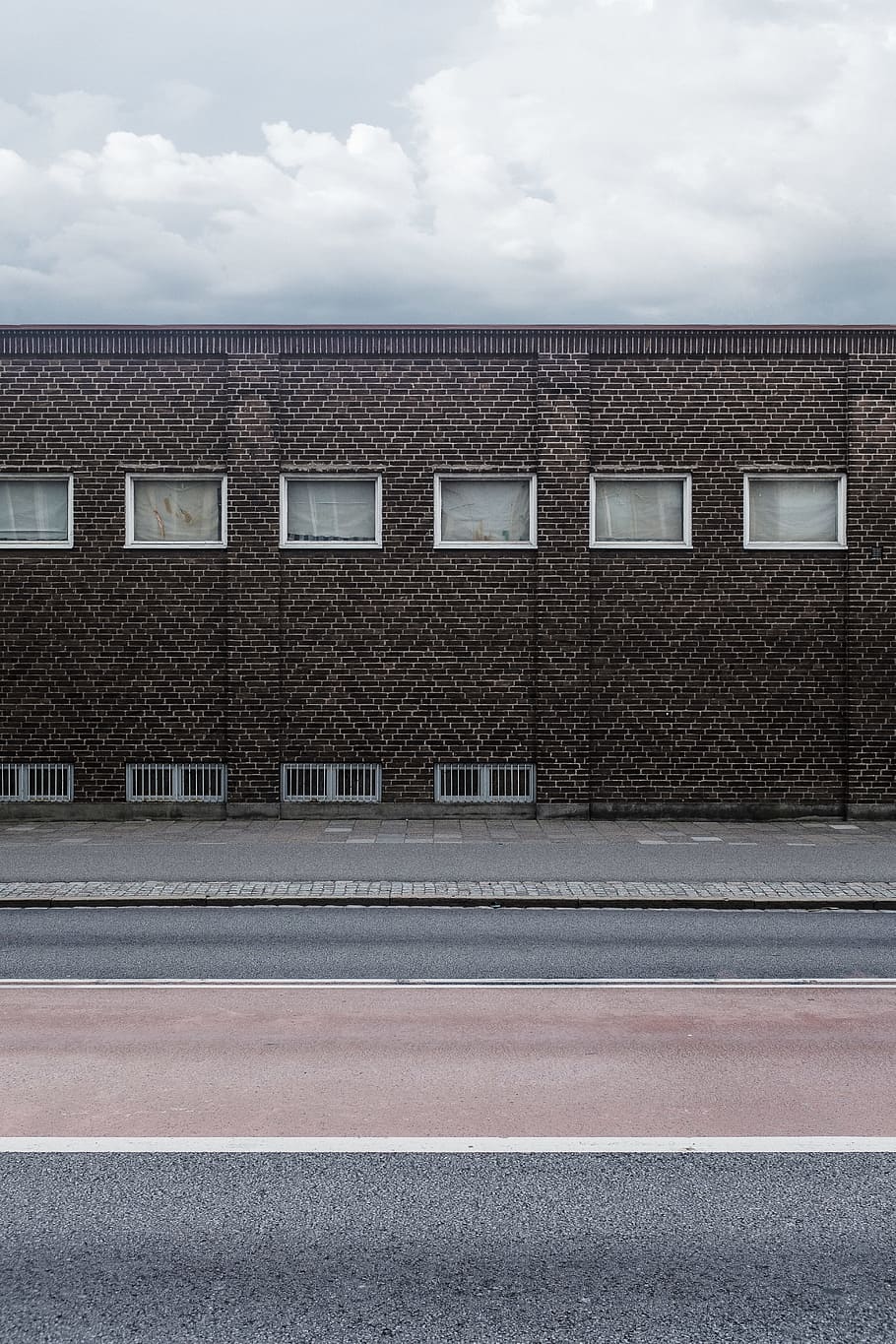 view of brown building, brick, stone, road, sidewalk, vent, window HD wallpaper