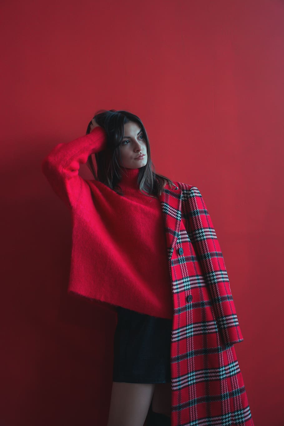 woman holding her head wearing red long-sleeved shirt and half of coat, HD wallpaper