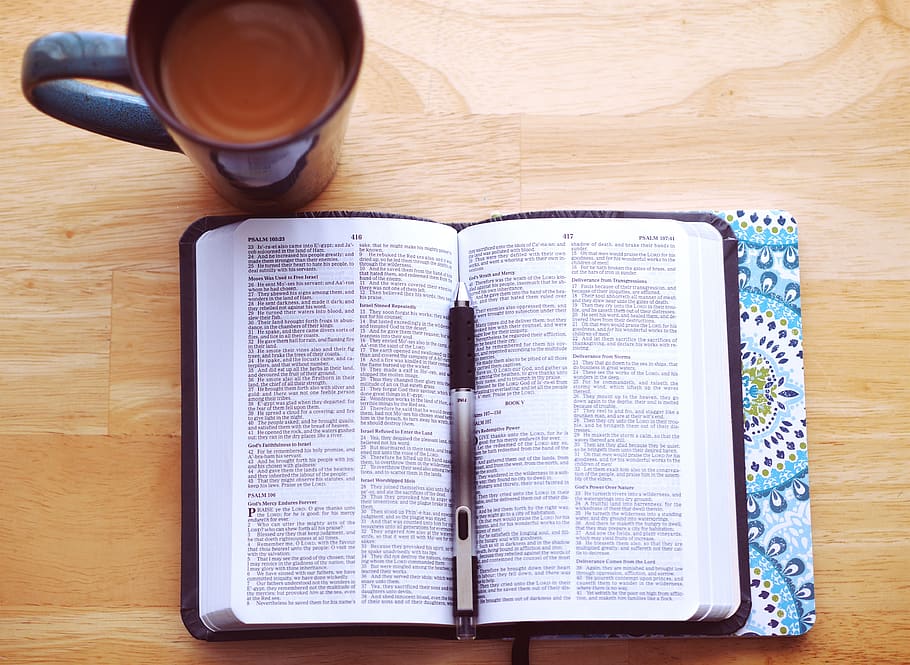 An open book with a pen, and a cup of coffee., bible, woman, lady
