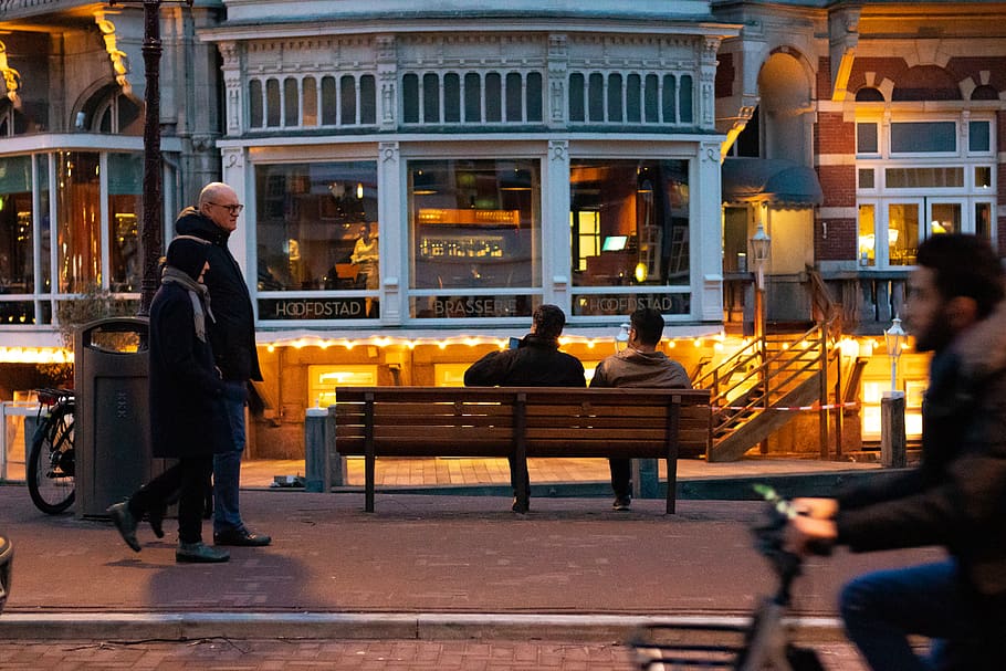two men sitting on brown bench, architecture, building exterior HD wallpaper