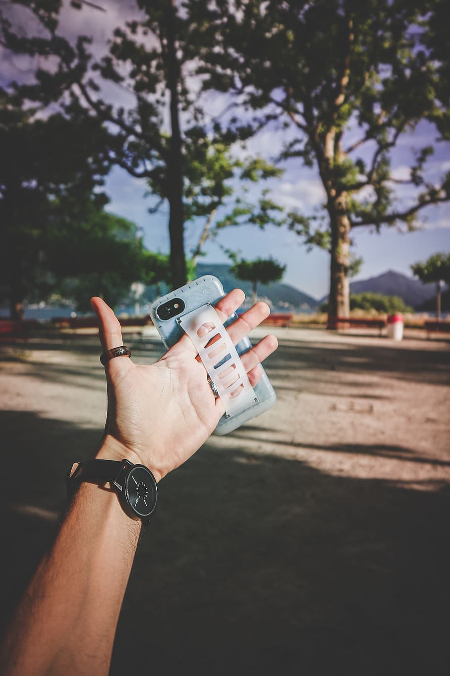 Person Wearing Gray Smartphone Case, action, close-up, daylight HD wallpaper