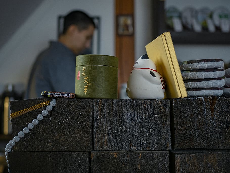 white cat figurine beside book, shelf, human, person, wood, plywood, HD wallpaper