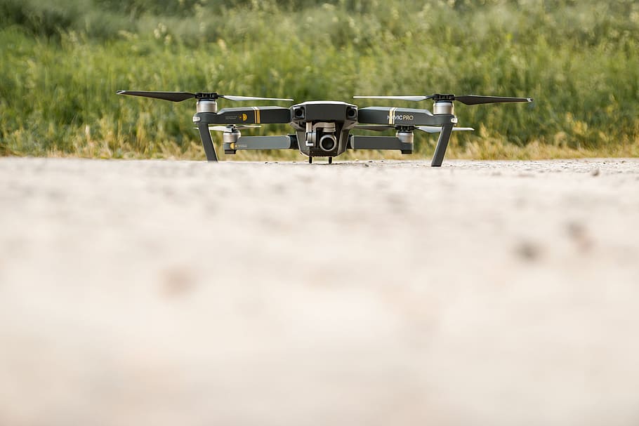 Modern drone on the ground and ready to fly, transportation, mode of transportation HD wallpaper