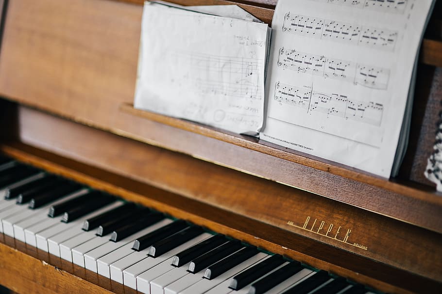 Old piano with sheet music, vintage, interior, nobody, keyboard