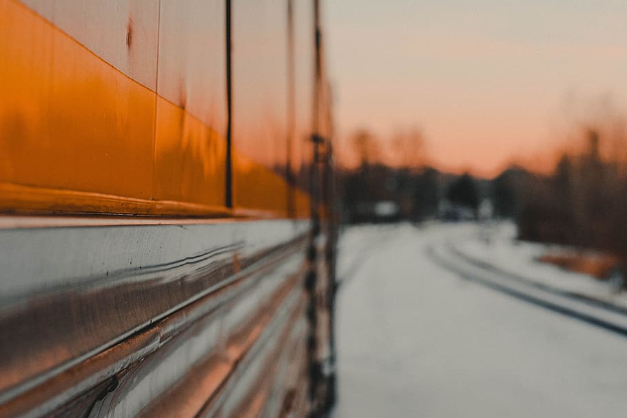 Grey and Orange Traine, blur, blurry, sunset, sky, snow, no people HD wallpaper