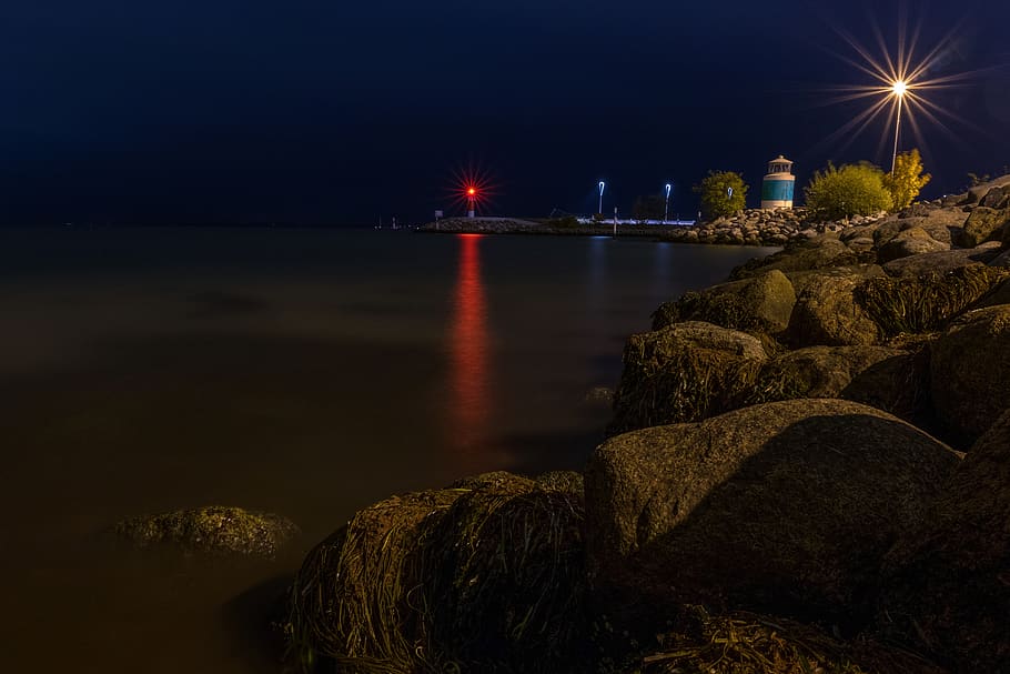 denmark, aarhus, night, lights, city, lighthouse, sky, motion HD wallpaper