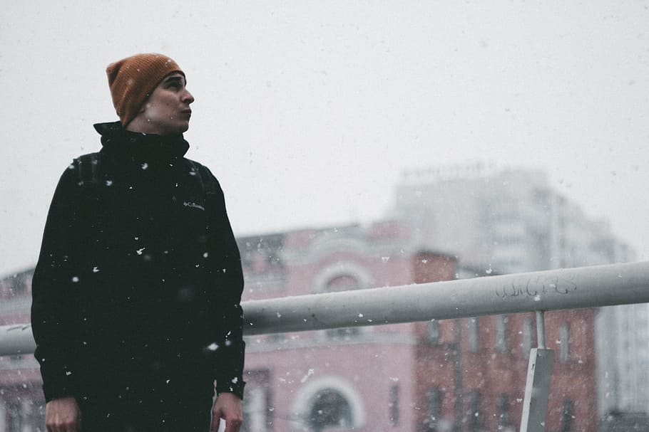 Man Wearing Black Jacket, blurred background, bonnet, building HD wallpaper