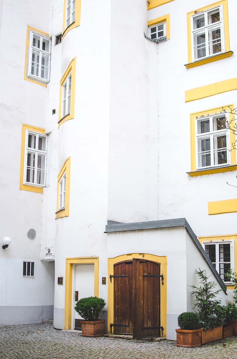 brown wooden door, building, architecture, yellow, window, city HD wallpaper