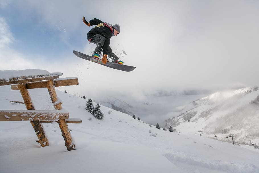 Man in Black Snowboard With Binding Performs a Jump, action, clouds HD wallpaper