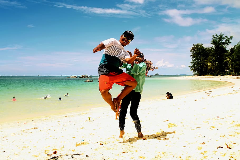 man, jump, beach, fun, ocean, sunset, daylight, smile, happy HD wallpaper