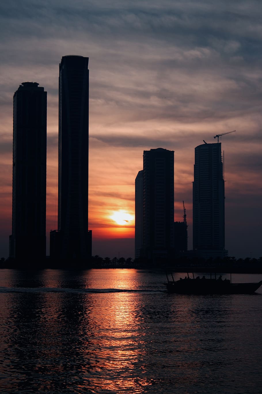 sunset, buildings, architecture, boat, sillouhettes, water HD wallpaper