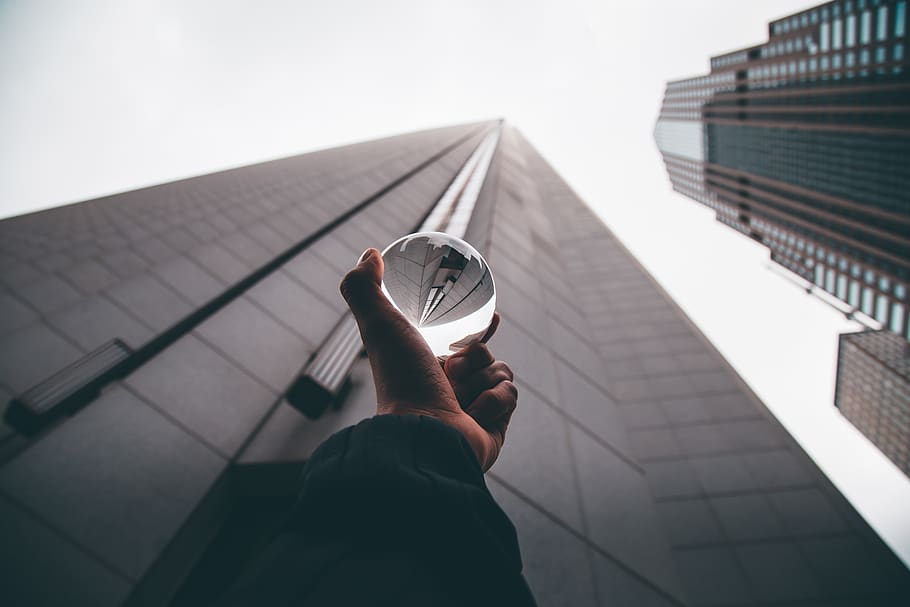 Person Holding Crystal Ball, architectural design, architecture