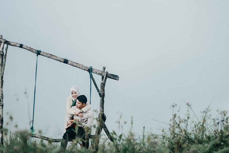 man sitting on swing, person, human, utility pole, tripod, apparel HD wallpaper