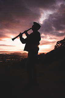 Silhouette Photo Of Person Playing Clarinet, backlit, dawn, dusk HD wallpaper