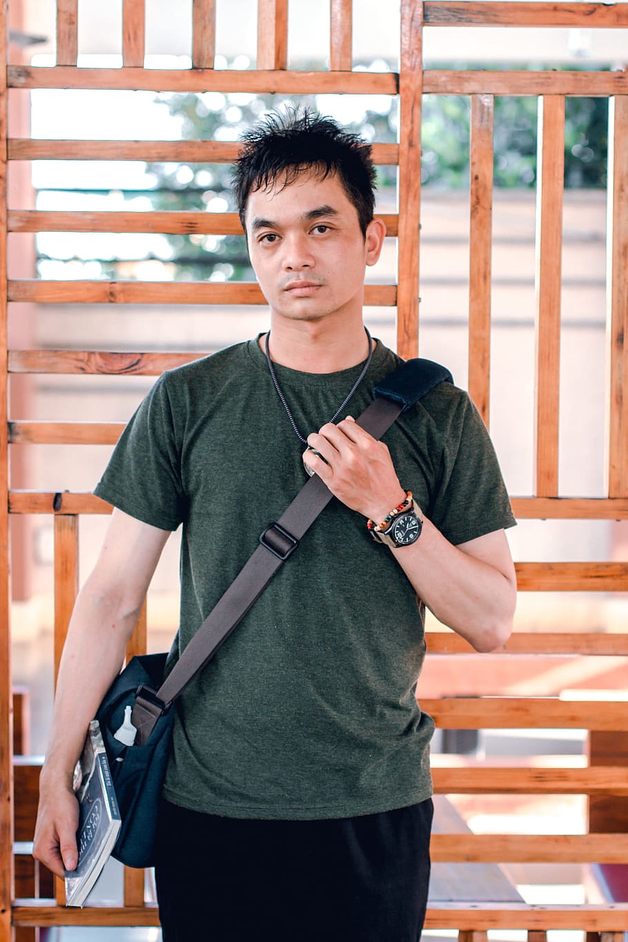 Man Holding Crossbody Bag Standing on Outdoors, alone, book, casual HD wallpaper