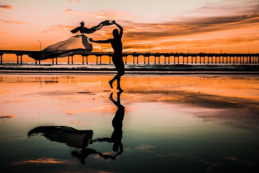 Silhouette Photo of Person Holding Scarf, backlit, beach, golden hour HD wallpaper