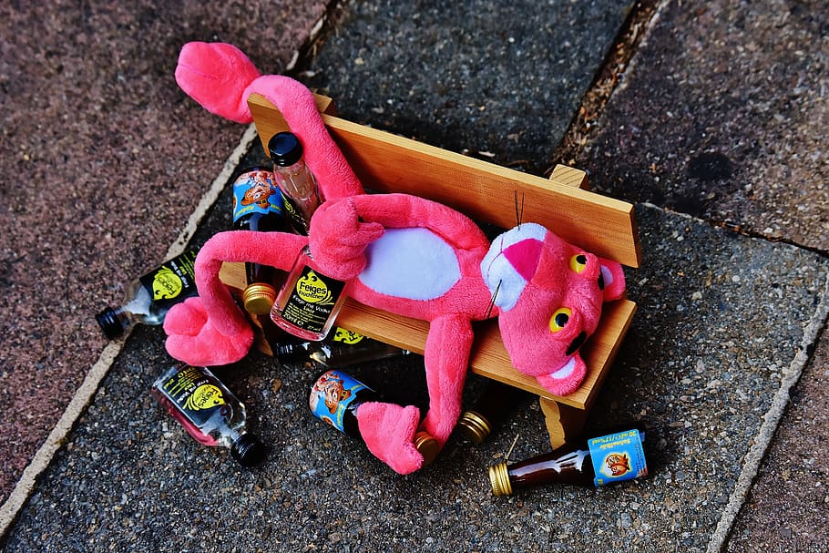 Pink Panther Plush Toy on Brown Bench Miniature, alcohol, art